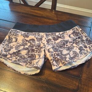 Oiselle Black and Cream Floral Long Roga shorts